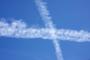 X marks the spot: vapour trails over Victoria Street, Westminster